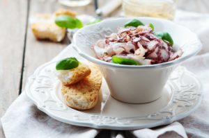 Octopus carpaccio in the table