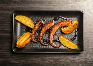 octopus tentacles grilled with potatoes